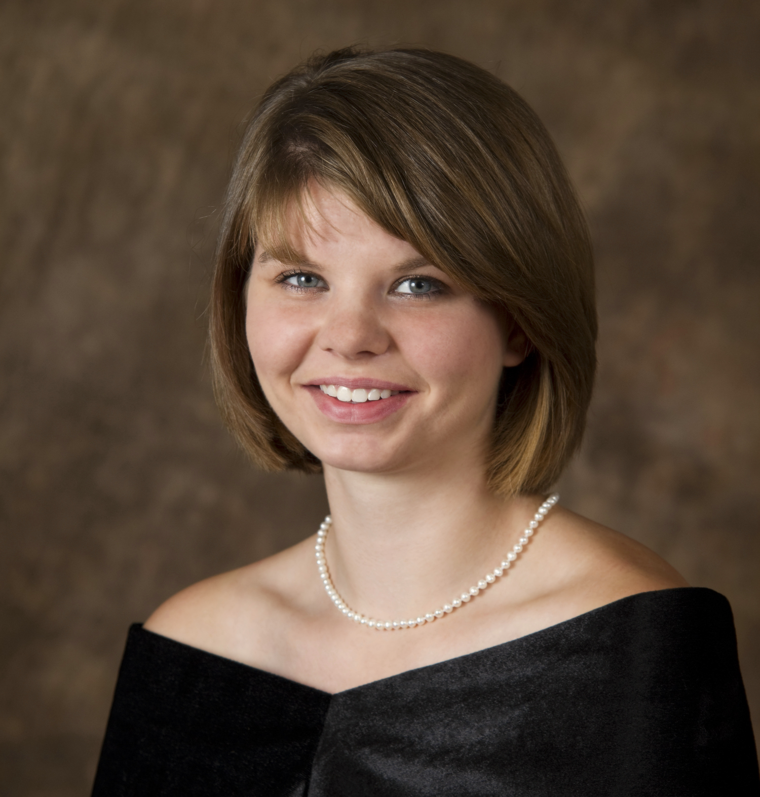 Young Girl Sitting For Her Studio High School Senior Portrait